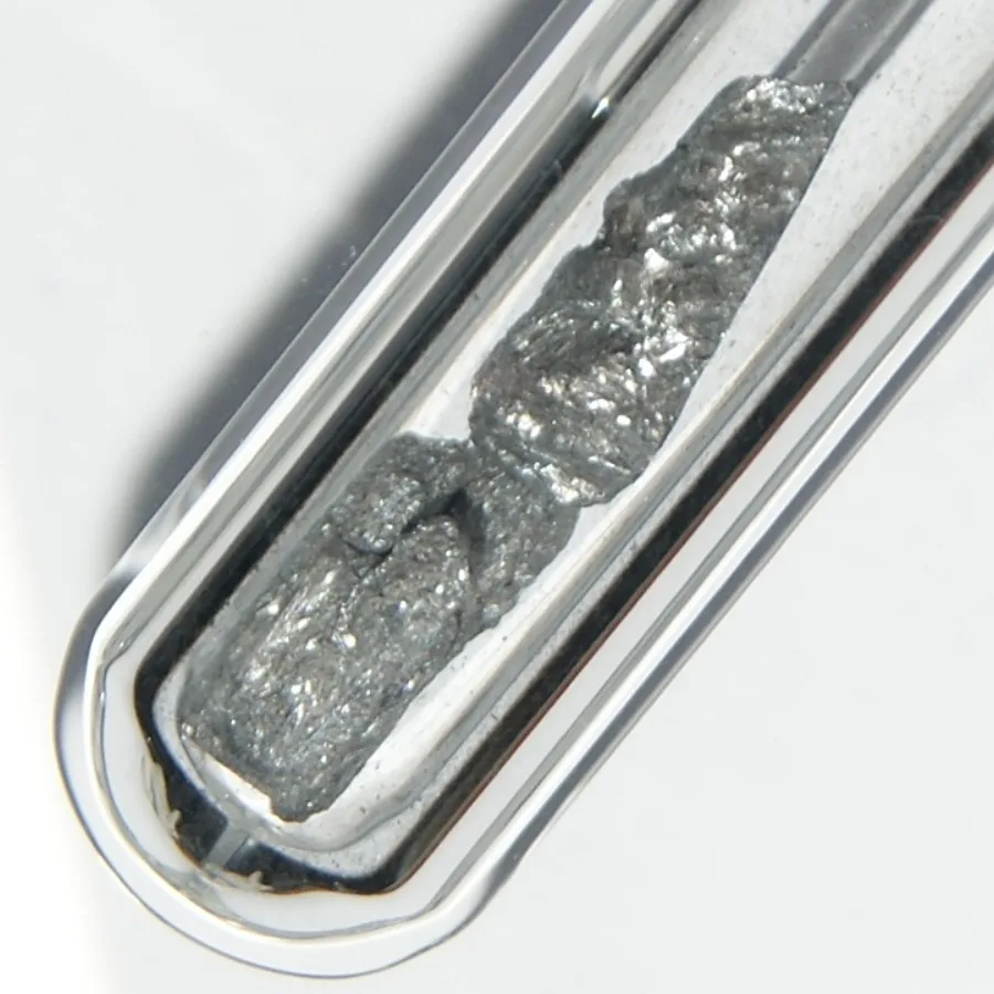 Arsenic sample. Appearance can vary with surface and storage conditions.