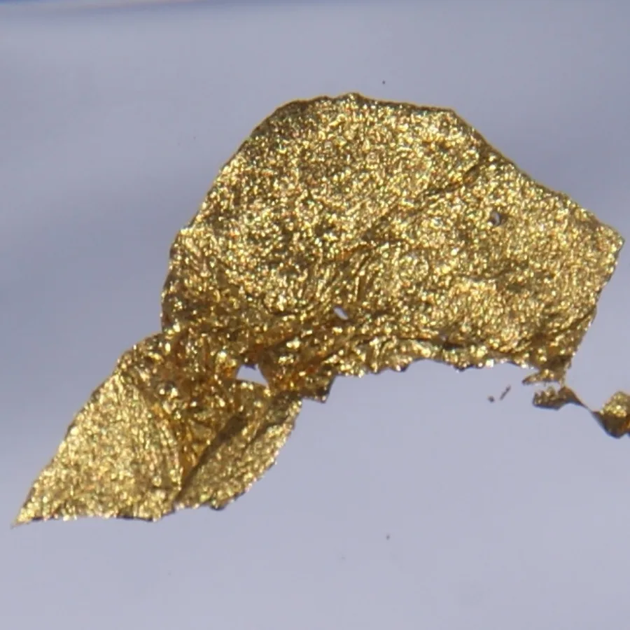 Gold sample. Appearance can vary with surface and storage conditions.