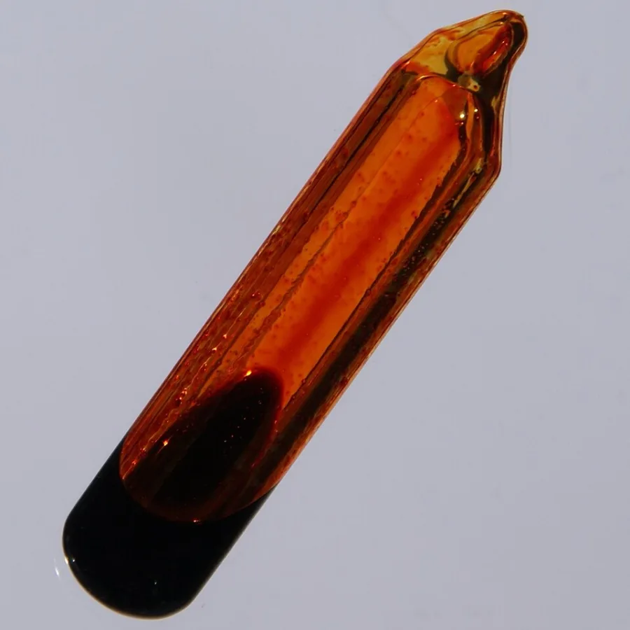 Bromine sample. Appearance can vary with surface and storage conditions.