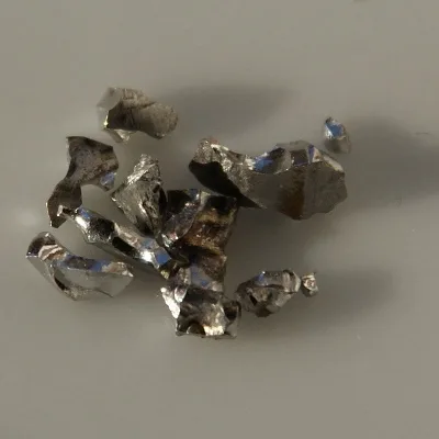 Iridium. Appearance depends on surface and storage conditions.
