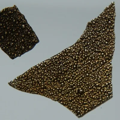 Manganese with crystals. Appearance depends on surface and storage conditions.