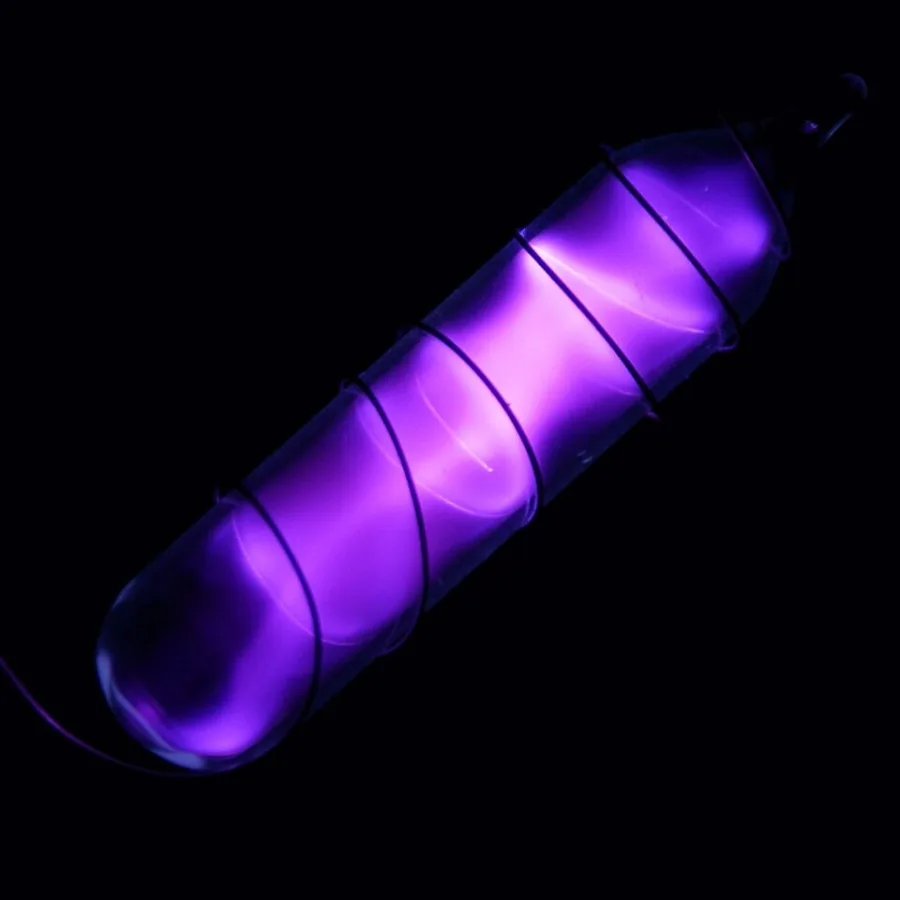 Nitrogen during an electrical discharge. The glow is not its ordinary room-temperature color.