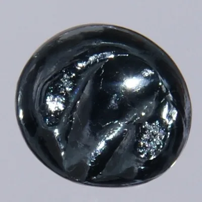 Osmium . Appearance depends on surface and storage conditions.