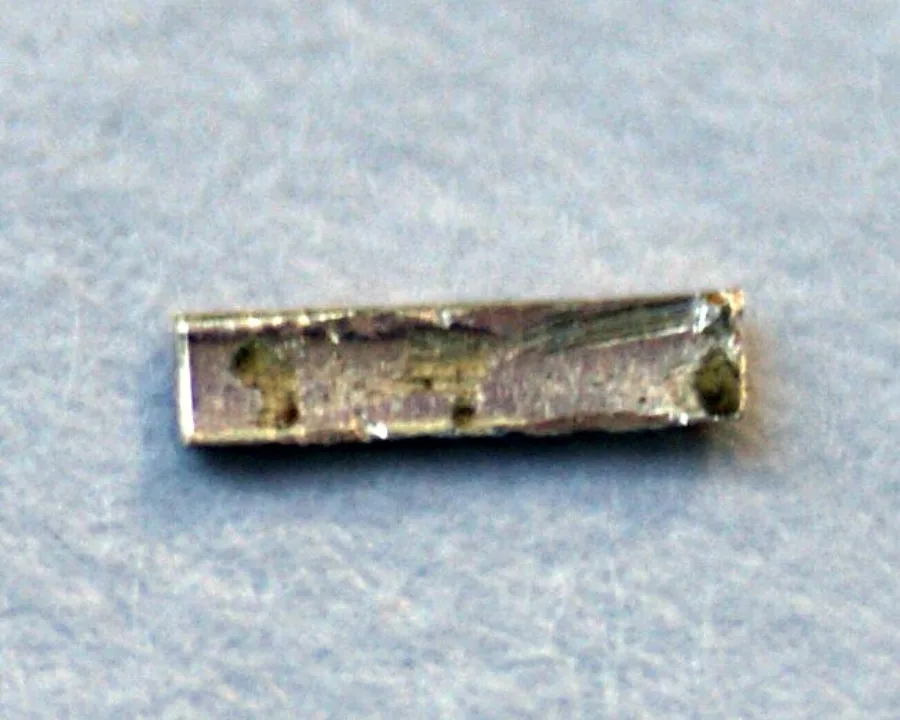 A radium-226 sample deposited on a small copper foil.