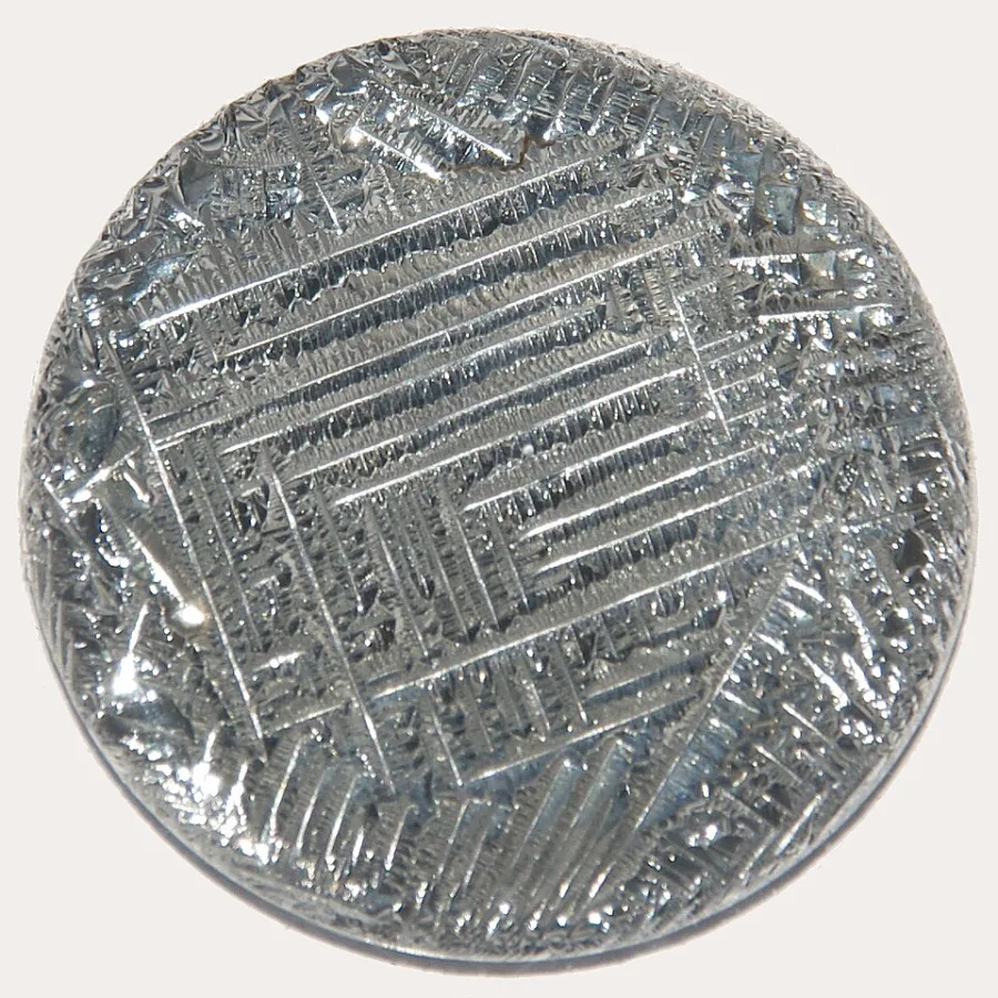 Tellurium sample. Appearance can vary with surface and storage conditions.