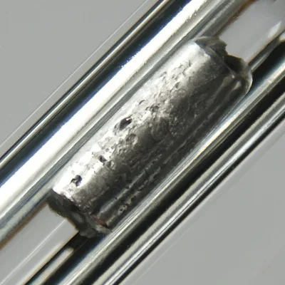 Thallium. Appearance depends on surface and storage conditions.
