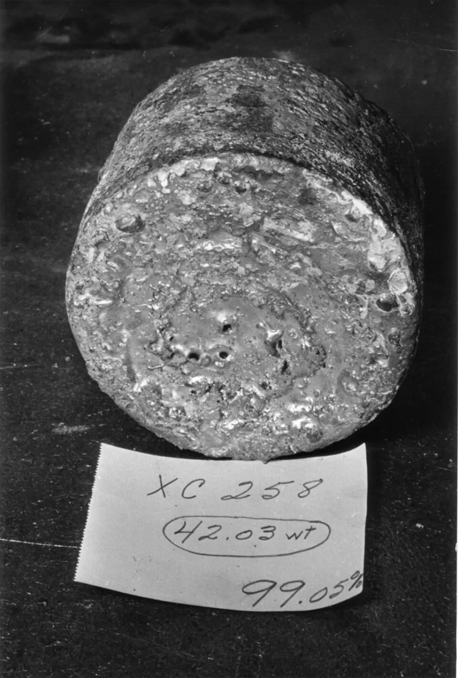 Uranium sample. Appearance can vary with surface and storage conditions.