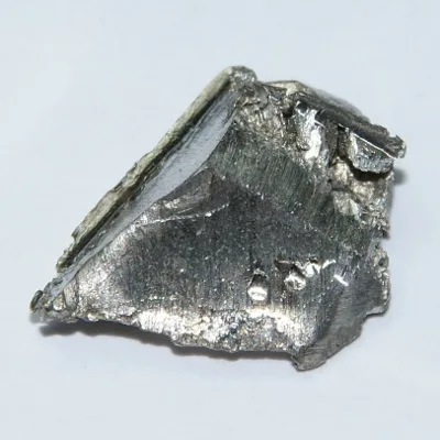 Ytterbium. Appearance depends on surface and storage conditions.